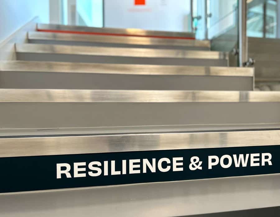 Resilience and power motivational staircase with inspiring message for success.