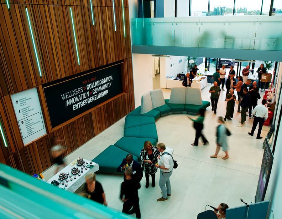 Innovative business conference with networking and collaboration in modern office space.